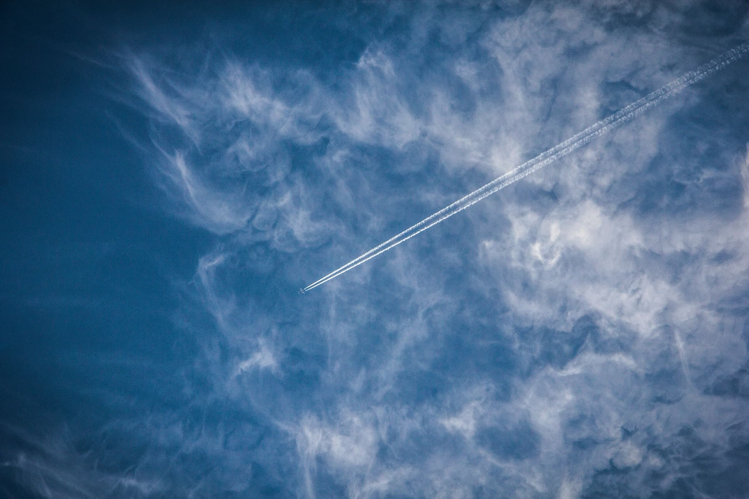 Aircraft at an airport gate at dusk